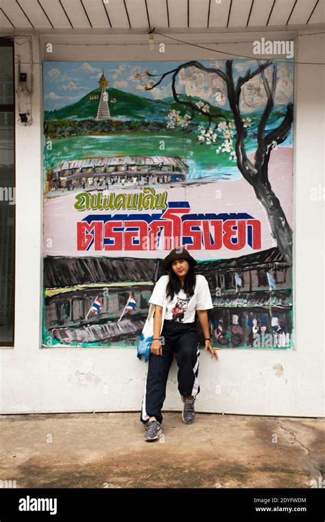 Travelers Thai Women Travel Visit Relax And Take Photo With Art On Wall