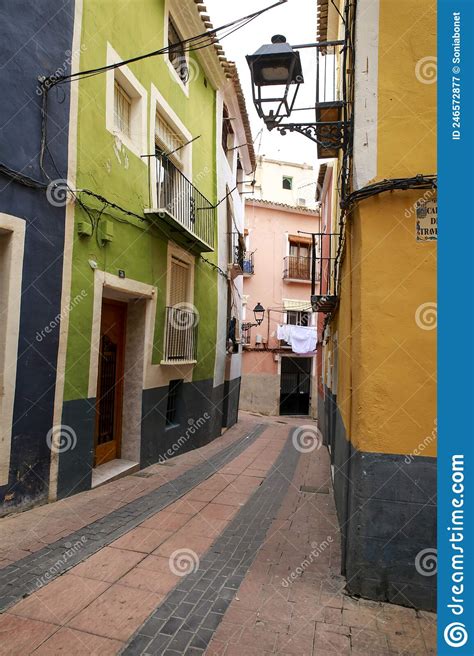 Narrow Cobbled Street And Colorful Facades In Villajoyosa Town