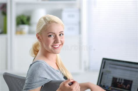 Smiling Mature Woman Sitting On Her Sofa Stock Photo Image Of Relax Caucasian