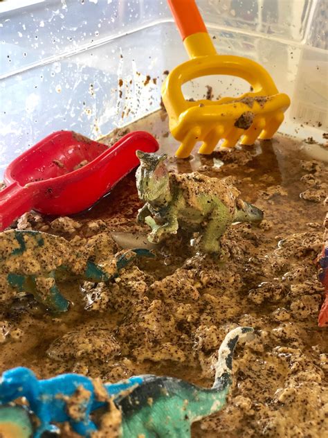 How 2 Create A Dirty Dinosaur Sensory Bin How2playtoday