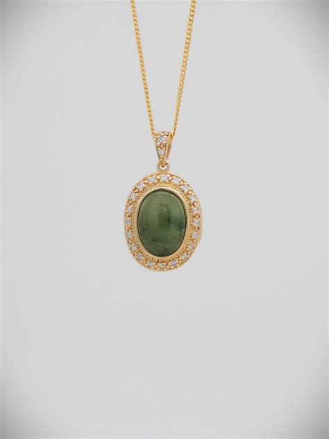 Moko Pounamu 14ct Gold Locket Genuine NZ Kahurangi Greenstone And