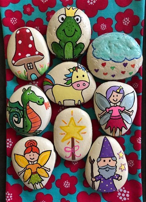 Some Rocks With Cartoon Characters Painted On Them