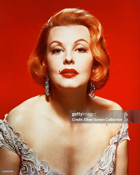 arlene dahl  actress wearing   cut top   studio portrait