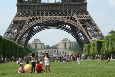 People Resting Near Eiffel Tower Wallpapers And Images Wallpapers