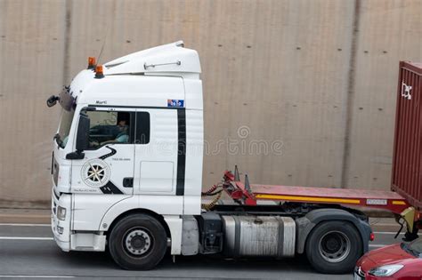 Volvo Fh Truck Loading A Red Container Trailer Along Barcelona S Ronda