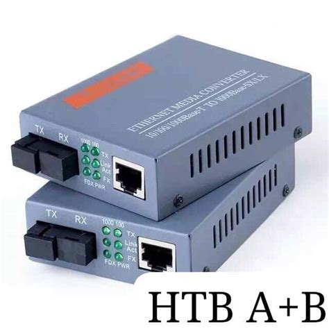 HTB 3100 MEDIA KONVERTER FIBER OPTIK OPTIC Fo Optical KE RJ45 HTB