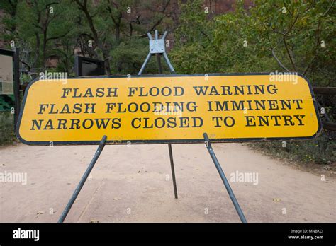 Flash flood warning sign hi-res stock photography and images - Alamy