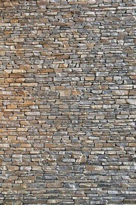 An Image Of A Stone Wall That Looks Like It Is Made Out Of Bricks