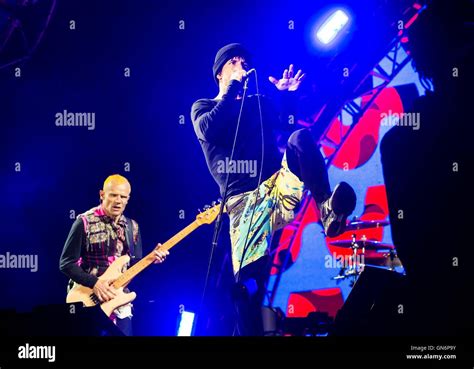 Red Hot Chili Peppers Lead Singer Anthony Kiedis Right With Bassist Flea Left As They