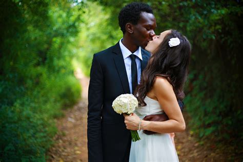 Bride And Groom Kissing At Ceremony