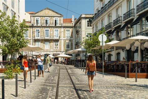 Tourists Walking Downtown Lisbon City In Portugal Editorial Image