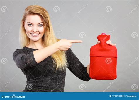 Happy Woman Holds Hot Water Bottle Stock Photo Image Of Woman