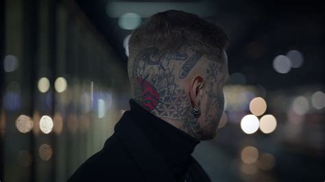 Unconventional Tattoos on Grandfather's Arms Reflect Life's Stories and Lessons 1