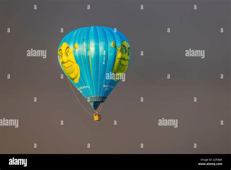 View Of People Flying In Hot Air Balloon Far Away In Stormy Cloudy Sky Sweden Stock Photo Alamy
