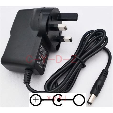 1PCS AC DC 9V 500MA Switching Power Supply Adapter Reverse Polarity