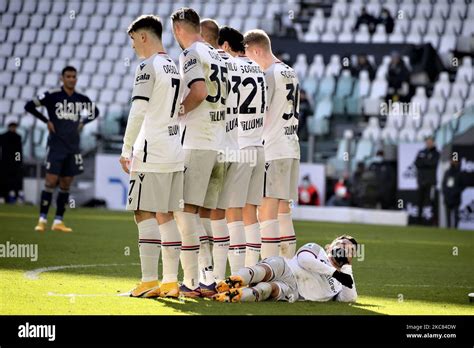 Nicola Sansone Of Bologna FC Lying Behind The Barrier During A Free