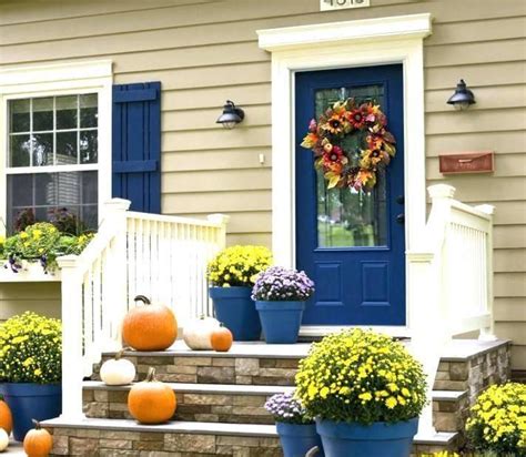 Transform Your Homes Curb Appeal With Tan Siding And Blue Shutters See The Stunning Before