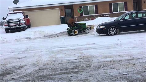 John Deere 325 Plowing 4 Inches Of Snow Without Tire Chains On Youtube