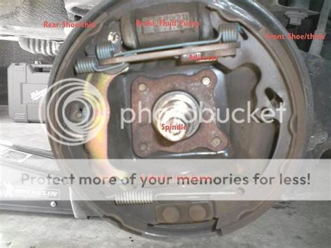 How to adjust ford fiesta rear brakes