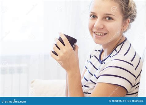 Blonde Drinks Coffee From A Brown Cup Output Stock Image Image Of