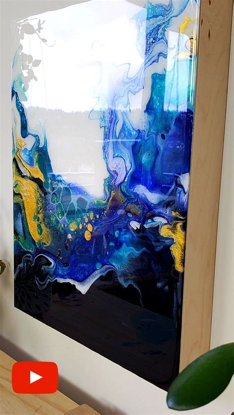 Ocean Inspired Fluid Art With Deep Blues And Bright Gold Covered