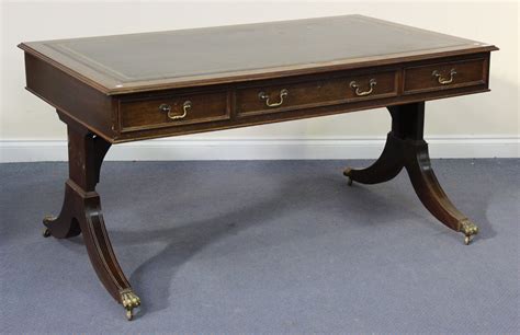 A 20th Century Reproduction Mahogany Library Table Fitted With A