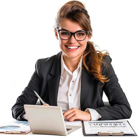 A Woman Sits At A Desk With A Computer And A Computer Screen Premium