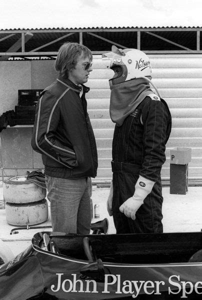 L To R Ronnie Peterson SWE March Talks With Gunnar Nilsson SWE