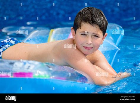 Boy In Swimming Pool Stock Photo Alamy