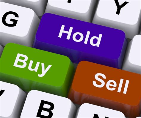 photo buy hold  sell keys represent market strategy analysis