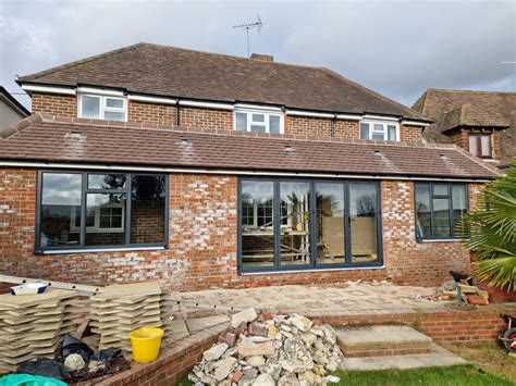 Bi Folding & Sliding Doors - TradeFit Sussex