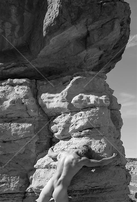 Naked Man And Rock Formations Rob Lang Images