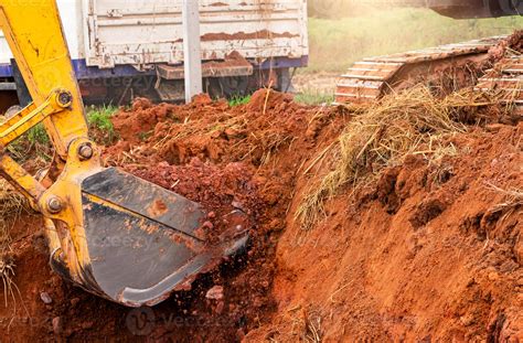 Excavator Bucket Digging Soil For Loading To Truck Earthwork Dirt