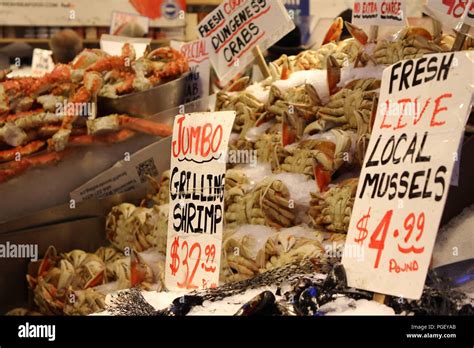 Seafood displayed at Pike Place Fish Co. at Pike Place Market in ...