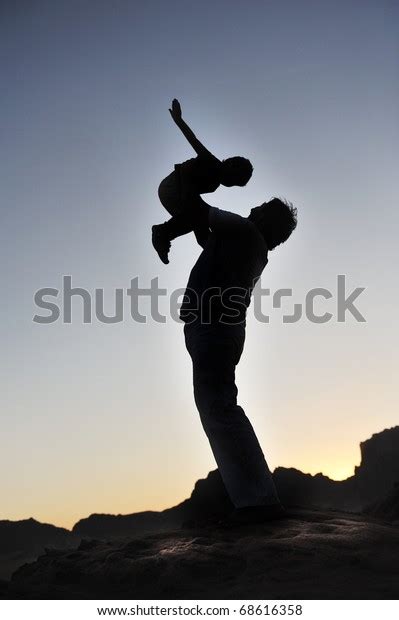 Silhouette Father Child On Beach On Stock Photo Edit Now 68616358