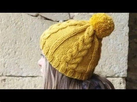 A Woman Wearing A Yellow Knitted Hat