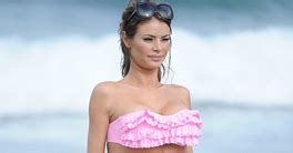 TOWIE S Chloe Sims Cavorts In The Sea In A Tiny Pink Bandeau Bikini BOLLYGROUP