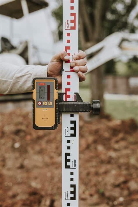 Land surveying tool used by a construction | Free Photo - rawpixel