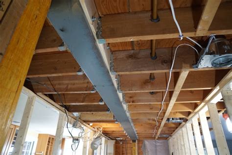 Replacing a Load-Bearing Beam With A Flush Beam - Concord Carpenter