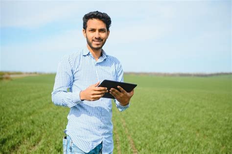 Premium Photo | Indian farmer in his wheat field