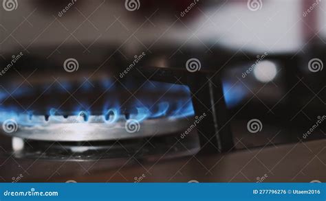 Gas Burner Spontaneously Ignites With Blue Flame Close Up Of Gas