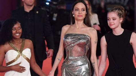 Angelina Jolie Dresses Up In Silver Bodycon Gown With Zahara Jolie Pitt And Shiloh For Eternals