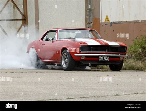 1967 Chevrolet Camaro American Muscle Car Doing A Tyre Smoking Burnout