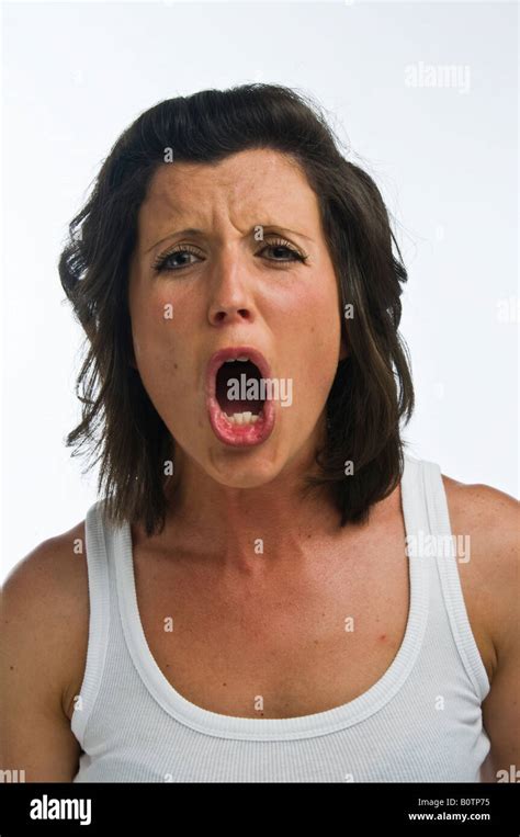 Angry shouting young woman Stock Photo - Alamy