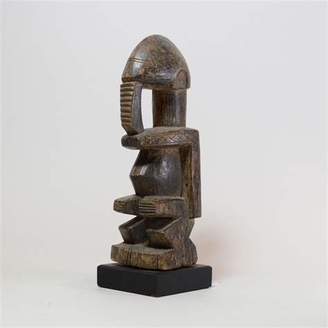 This powerful piece is an ancestor figure made by the Dogon people of ...