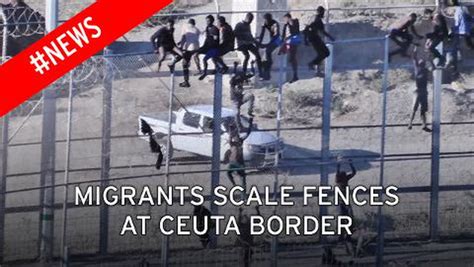 African Migrants Lacerated By Razor Wire As They Get Trapped On Top Of Spanish Border Fence For