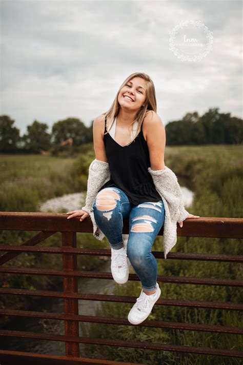 Unique Senior Girl Poses Candid Flowers Nature Outdoors