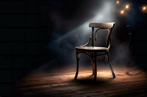 Premium Ai Image Chair On A Stage With Spotlights