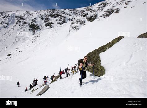 Skiers Climbing Tuckerman Ravine In New Hampshires White Mountains