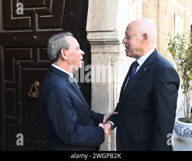 Tunisian Prime Minister Ahmed Hachani Looks On During A Press